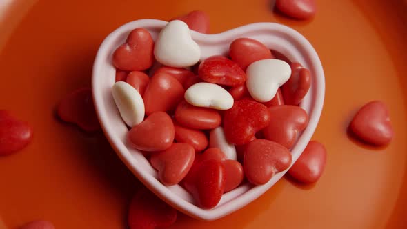Rotating stock footage shot of Valentines decorations and candies - VALENTINES 0076