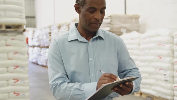 Portrait of man working in a warehouse 4k