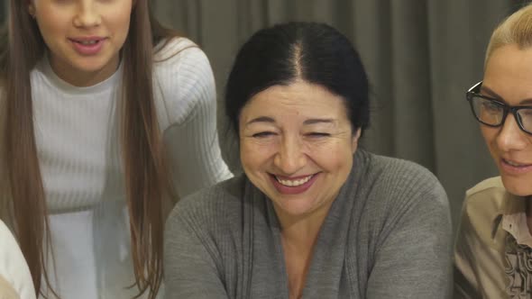 Cropped Shot of Happy Businesswomen Enjoying Working Together