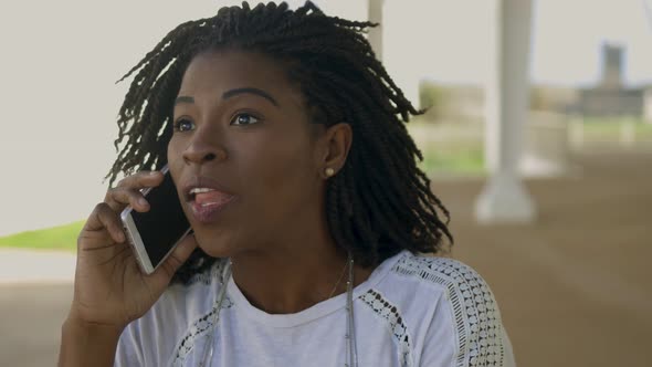 Focused African American Businesswoman Talking on Smartphone