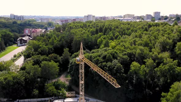 Construction Site with Crane and Building