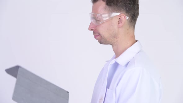 Man Scientist Changing Clothes with Tie-dye Shirt and Partying