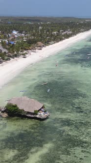 Tanzania  Vertical Video House on Stilts in the Ocean on the Coast of Zanzibar Slow Motion