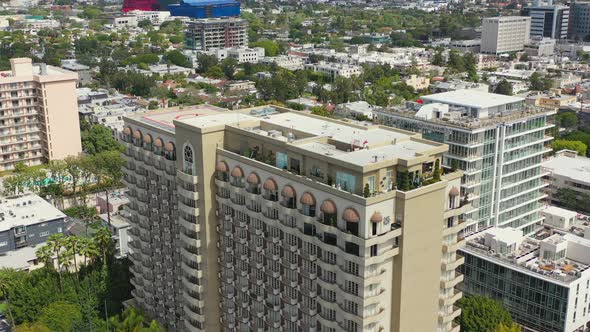 Aerial approach of high-rise apartment buildings in Beverly Hills