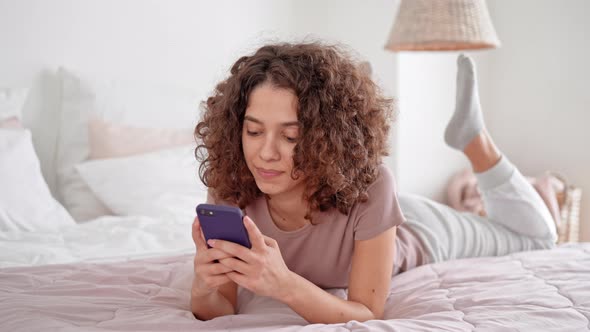 Female Messaging Holding Mobile Leisure at Home