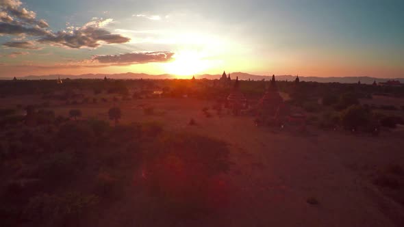 Flying Over Temples in Bagan at Sunset