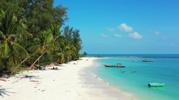 Aerial drone tourism of marine coast beach journey by blue sea and bright sand background of journey