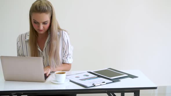 Blonde Business Woman Working at Modern Office
