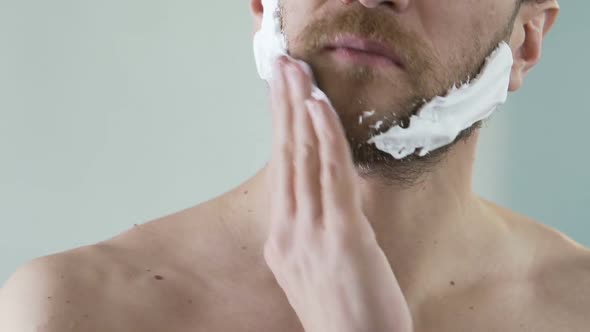 Man Applying Shaving Foam on Face Skin, Skincare and Hygiene, Morning Ritual