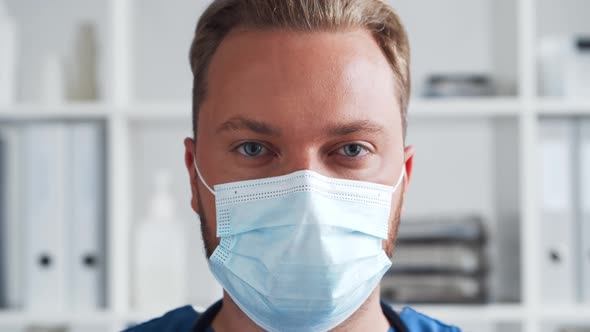 Professional medical doctor in hospital office, Portrait of young and confident physician.