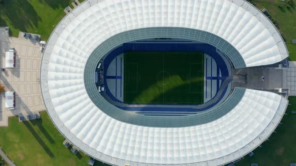 Birds Eye Overhead Top Down Aerial View of Football White Stadium with Green Grass in Berlin