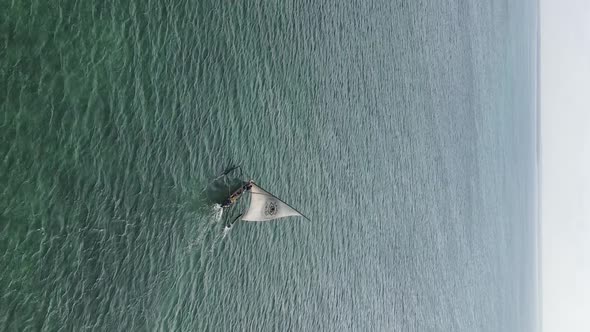 Tanzania Vertical Video  Boat Boats in the Ocean Near the Coast of Zanzibar Aerial View