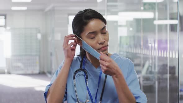 Portrait of female doctor wearing face mask in hospital