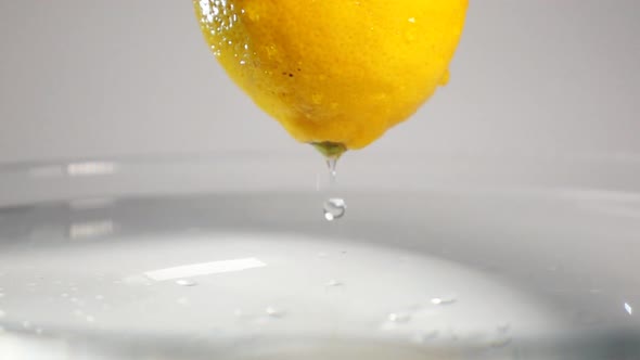 Drop of Water Drip From Lemon