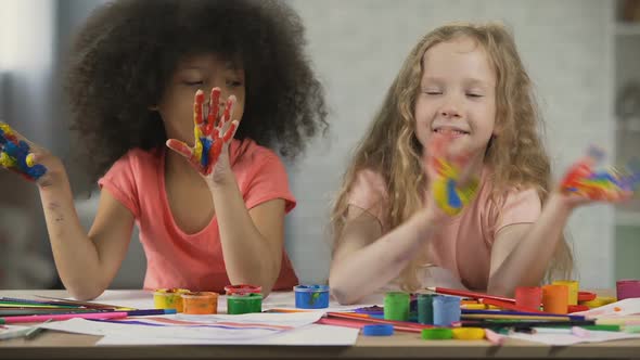 Kids Art Club. Multiracial Children Waving Painted Palms and Singing, Childhood