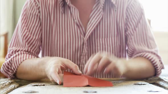 Person Making Origami Heart, Stop Motion