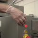 a Woman's Hand in a Latex Glove Presses the Start Button on Production Equipment - VideoHive Item for Sale