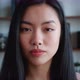 Closeup Confident Face Portrait of Beautiful Asian Girl Lady Young Woman Looking at Camera at Modern - VideoHive Item for Sale