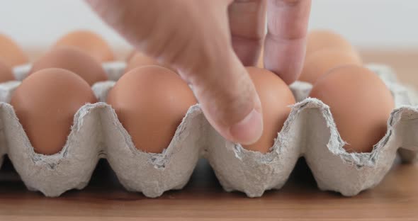 Hand pick eggs from package