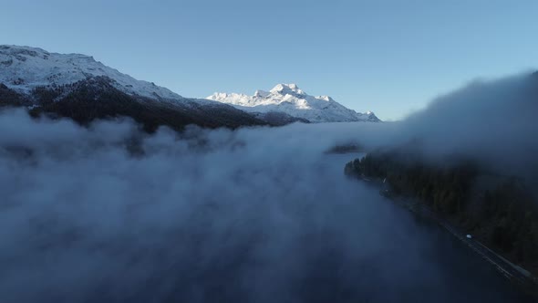 Fog and road, St. Moritz, Canton of Graubunden, Switzerland