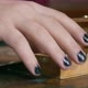 Person with Black Nail Polish on Nails Takes Small Music Box From Table to Listen to Uncomplicated - VideoHive Item for Sale