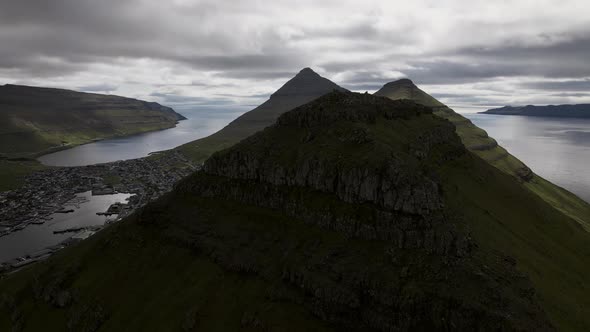 Drone Over Hikers On Klakkur With Klaksvik Town Below