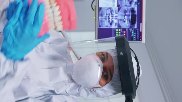 Vertical Video Patient Pov of Dentist Medical Team Teaching Child to Clean Teeth