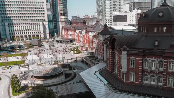 time lapse of Tokyo station, a railway station in the Marunouchi business district in Tokyo, Japan