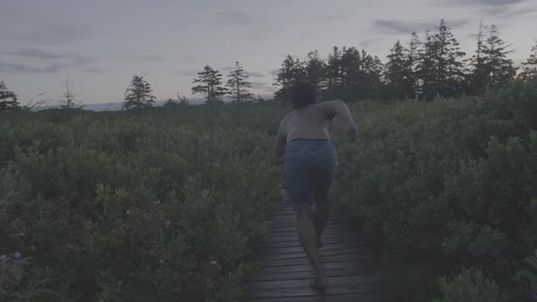 Dancer on boardwalk