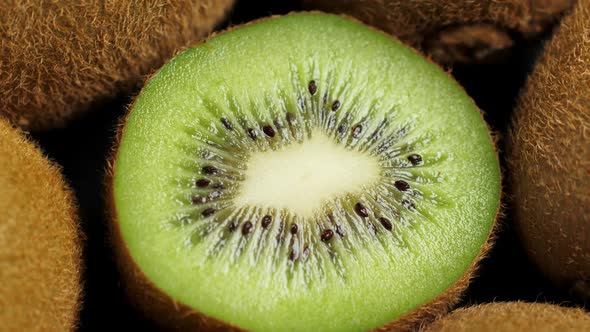 A Lot of Whole and One Half Kiwi Rotating