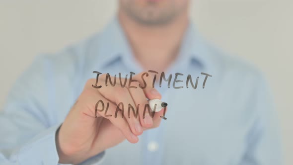 Investment Planning, Man Writing on Transparent Glass Screen