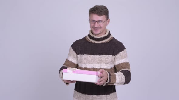 Handsome Bearded Man Opening Empty Gift Box