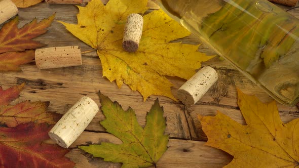 Wine bottles and corks on an old vintage wooden board 3