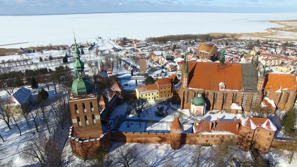 Aerial: Castle of Frombork in Poland, wintertime