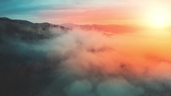 Aerial Romantic Colorful Sunset Over Mountain