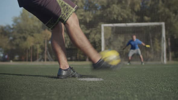 Footballer Scoring a Goal After Penalty Shot