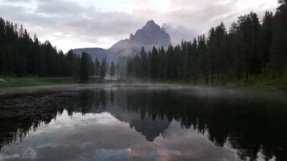 Mountain lake in the Dolomites with Tre Cime di Lavaredo reflection