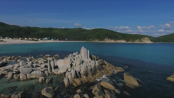 Aerial Shot of Coastline Bay with the Rocks and Cliffs