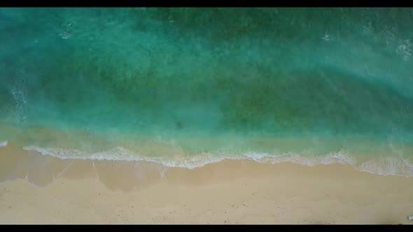 Aerial landscape of luxury coast beach vacation by blue sea with white sandy background of a dayout 