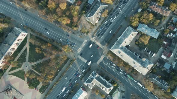 A Wide Road Intersection in the Morning a Lot of Cars Pass Straight