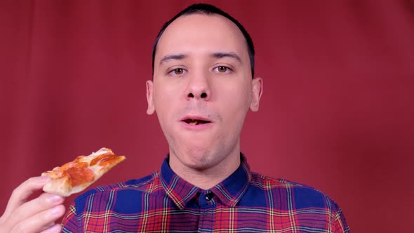 Man Eating a Pizza. Close-up Shot. Fast Food Eats