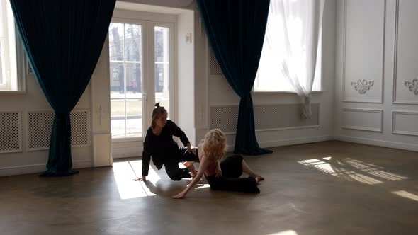 Two Dancers are Rehearsing in Hall Contemporary Dance Performance Moving Slowly