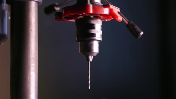 Slider Pan Shot of a Drilling Machine Rotation in Workshop