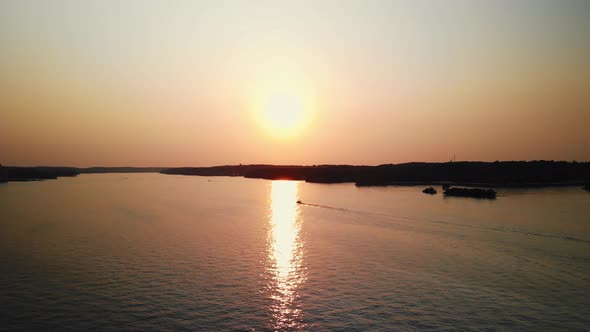 A Shot of the Sunset Over the River Taken From a Drone