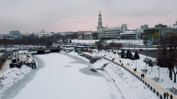 Winter aerial city view, river embankment Kharkiv