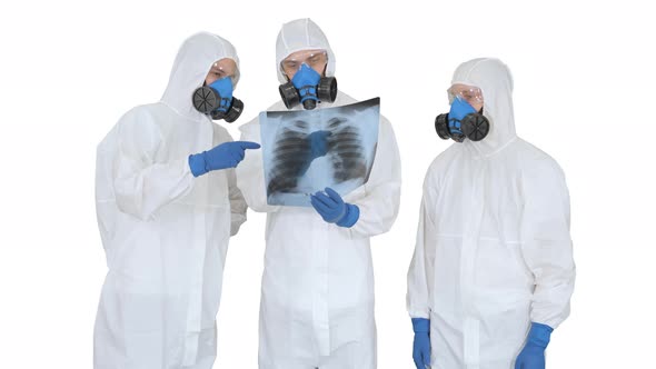 Medical Doctors with X-ray Image of the Lungs of a Covid-19 Patient on White Background