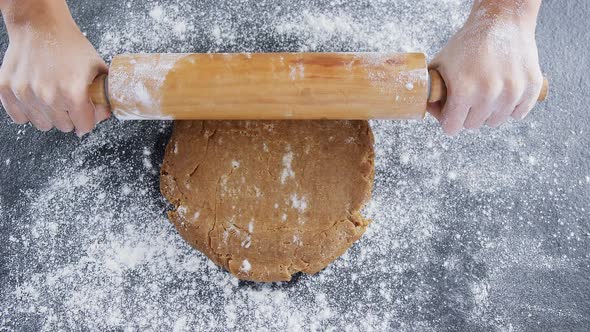 Woman using rolling pin