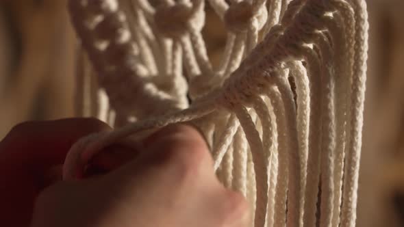 Women's Hands Weave Macrame in Boho Style