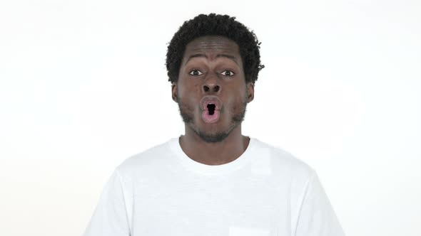 African Man Celebrating Success, White Background