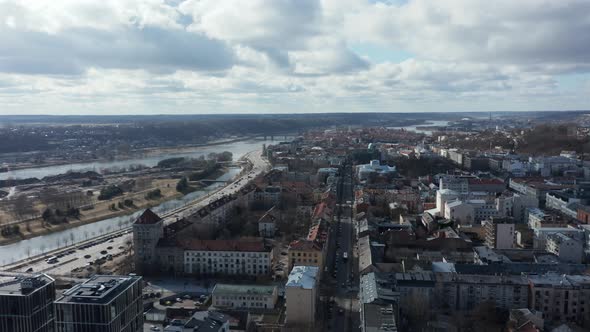 AERIAL: Flying Above Kaunas City with Nemunas River and Oldtown in Background
